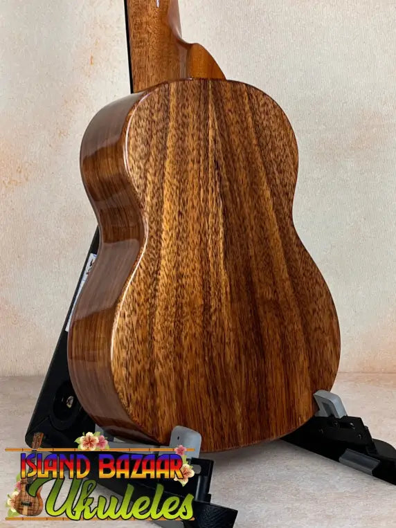 Wooden acoustic guitar with unique grain patterns on the KoAloha KSM-10 Soprano Ukulele