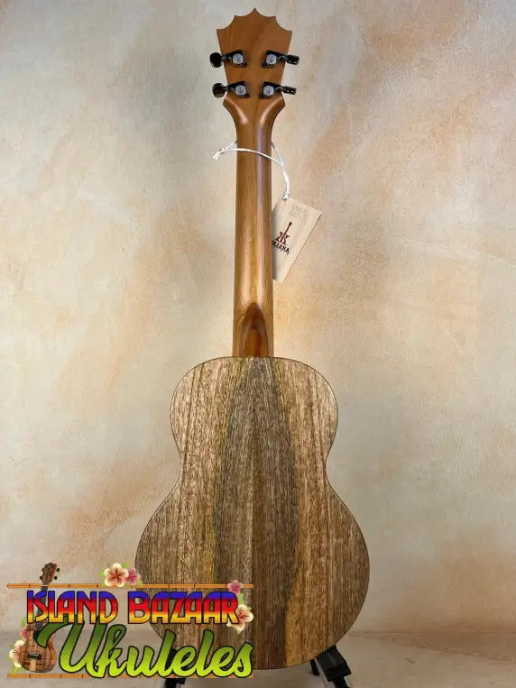 Wooden KoAloha KTM-10RP-MG Tenor Mango Ukulele with natural grain and dark headstock