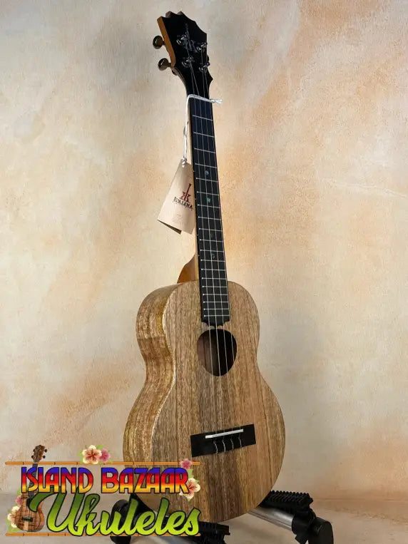 Wooden ukulele with natural grain finish and black strings, KoAloha KTM-10RP-MG Tenor