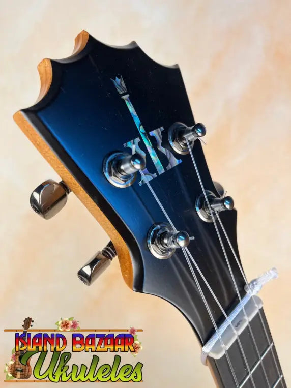 Guitar headstock with chrome tuning pegs on KoAloha KTM-10RP-MG Tenor Mango Ukulele