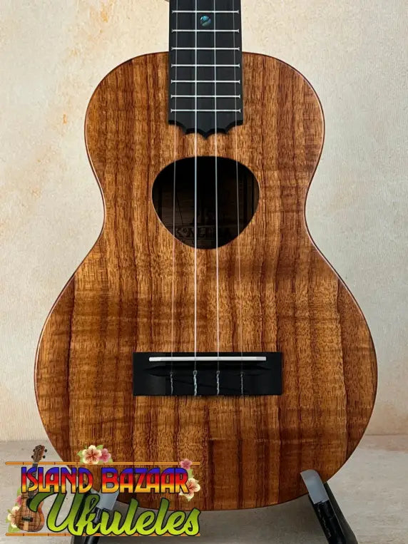 Beautiful Koa wood Ukulele with dark grain patterns, KoAloha Royal Pikake KCM-00RP