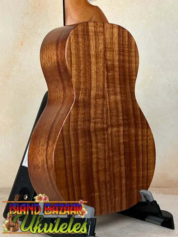 Acoustic guitar with striped Koa wood back, KoAloha Royal Pikake Concert KCM-00RP