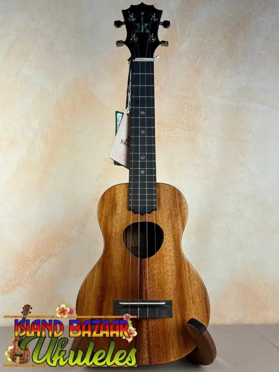 Wooden KoAloha Royal Pikake Concert Ukulele with heart-shaped sound hole features