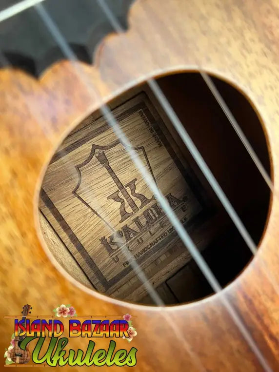 KoAloha Royal Pikake Concert Ukulele Koa Satin-Finish with visible label in sound hole