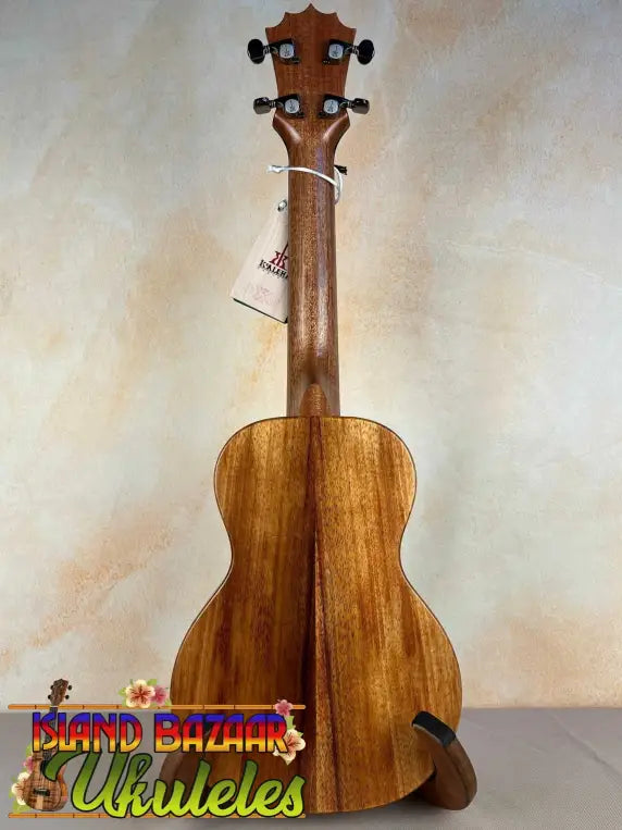 Wooden ukulele with natural finish and dark pegs from KoAloha Royal Pikake Concert