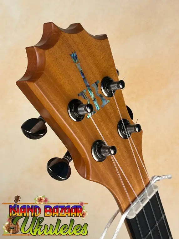 Ukulele headstock with tuning pegs on Koaloha Royal Pikake Tenor Uke in solid Hawaiian koa