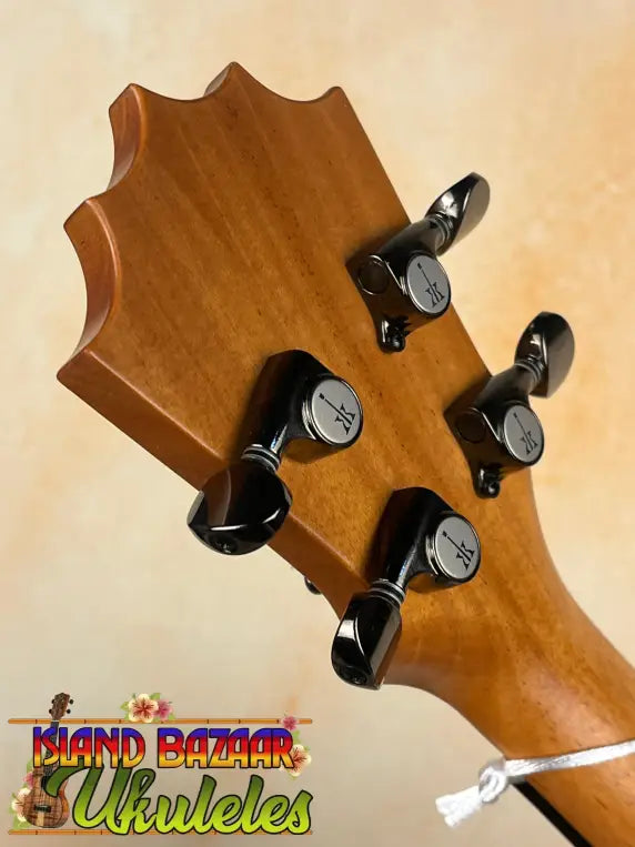 Ukulele headstock with tuning pegs of Koaloha Royal Pikake Tenor Uke in solid Hawaiian koa