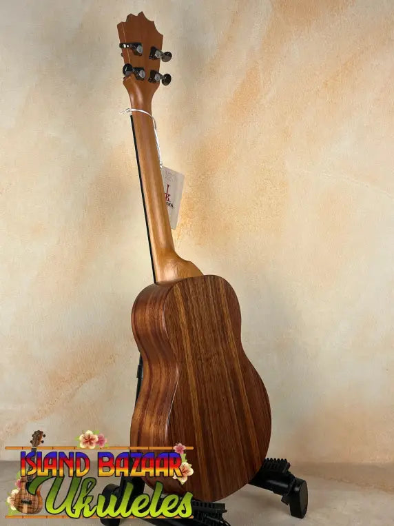Wooden ukulele on stand for Koaloha Royal Pikake Tenor Uke KTM-10 with solid Hawaiian koa