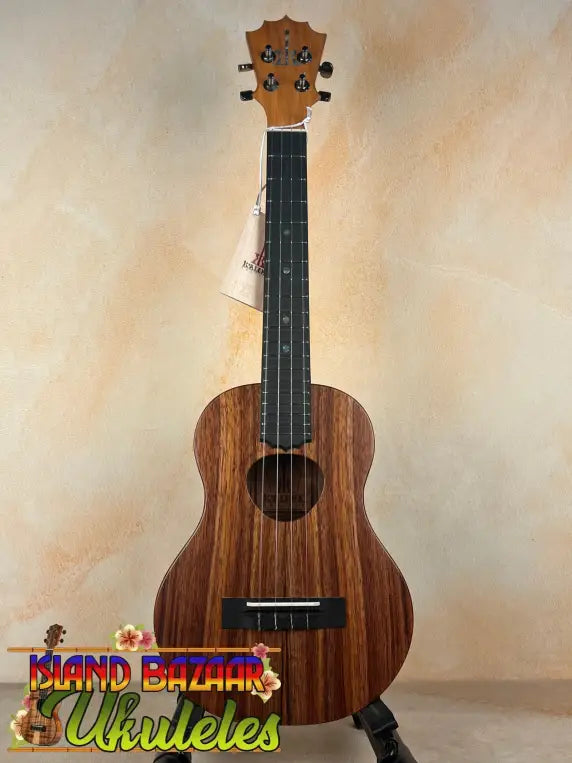 Brown wooden ukulele from Koaloha Royal Pikake Royal Pikake Tenor, made with solid Hawaiian Koa