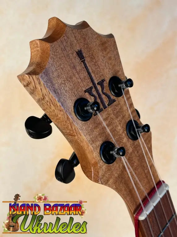 Wooden ukulele headstock with black tuning pegs of KoAloha Tenor Opio KTO-10S