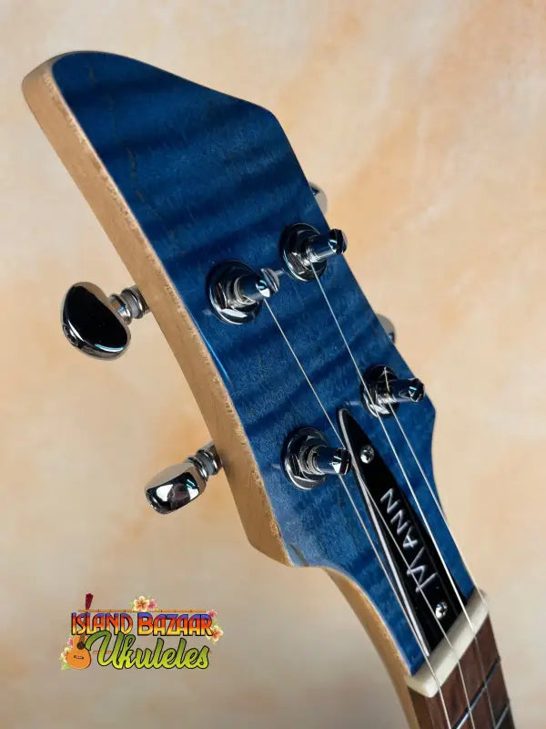 Blue guitar headstock with chrome tuning pegs from Mann Electric Tenor Ukulele Solid Body