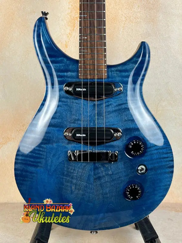 Mann Electric Tenor Ukulele with translucent blue finish and black hardware solid body