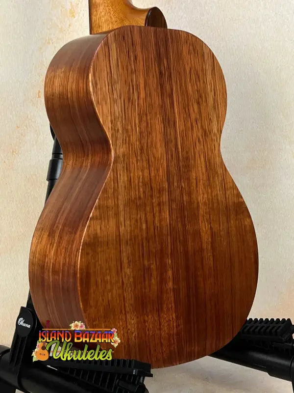 Wooden Kamaka Concert Ukulele HF-2 in solid Koa with rich brown grain patterns