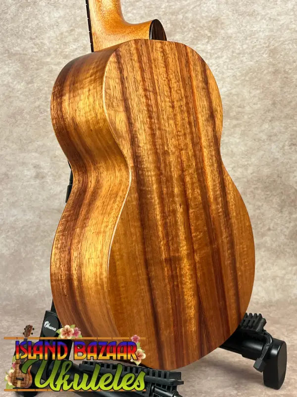 Wooden ukulele back showcasing the solid koa of the New Kamaka HF-3 Tenor Ukulele