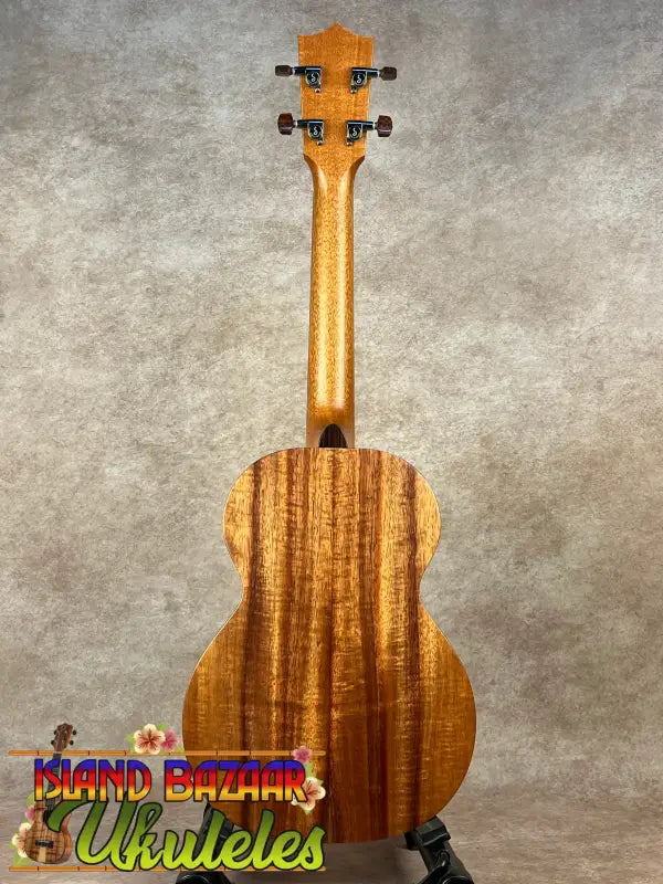 Wooden ukulele back on New Kamaka HF-3 Tenor Ukulele Solid Koa model