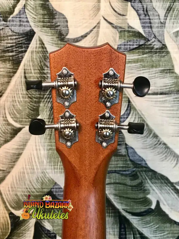 Guitar headstock with chrome tuning pegs, featured in Kanile’a K-1 Soprano Ukulele
