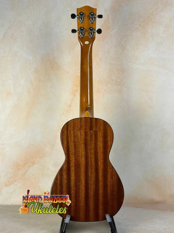 Ohana CK-35G Solid Mahogany Concert Ukulele showcasing a beautiful mahogany body