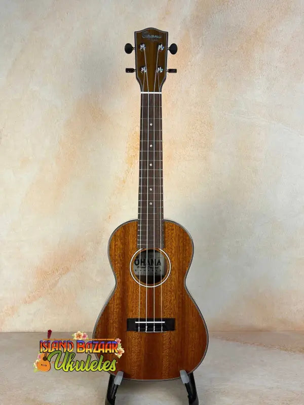 Wooden Ohana CK-35G Solid Mahogany Concert Ukulele with dark brown finish and black tuning pegs