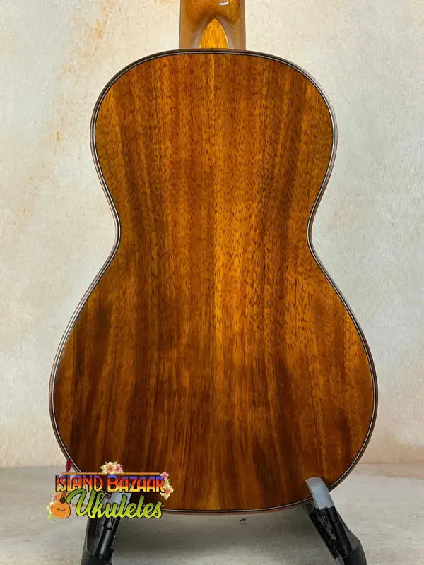 Wooden acoustic guitar with mahogany back, featured with Ohana CK-370G Concert Ukulele