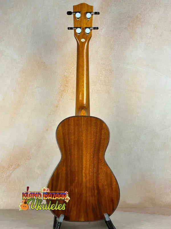 Ohana CK-370G Concert Ukulele with natural brown finish and solid Hawaiian Koa construction