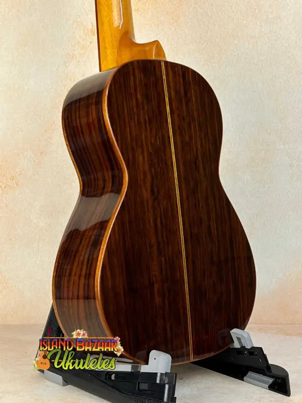 Classical acoustic guitar with dark rosewood, featured in Ohana CK-50G Ukulele