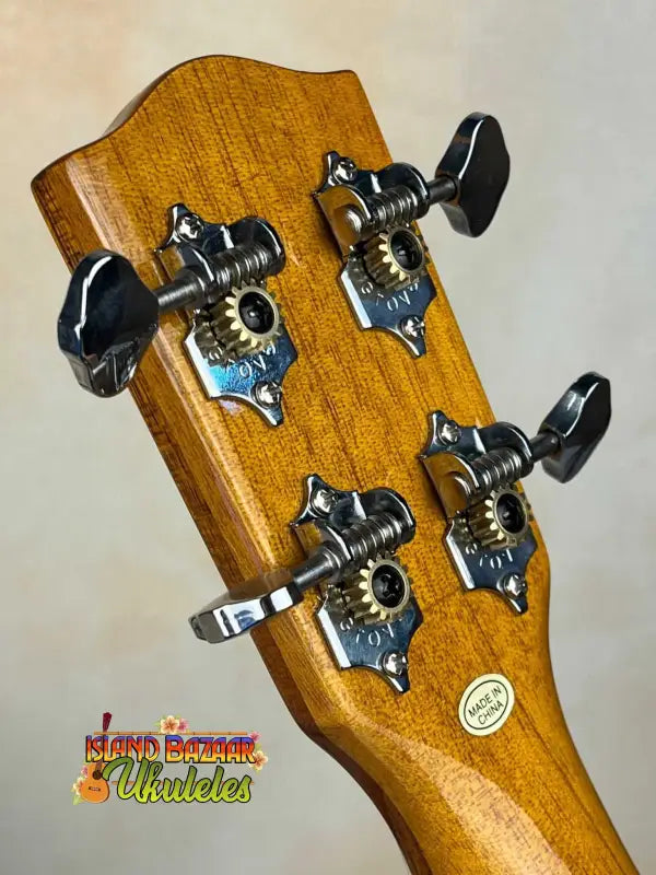 Wooden guitar headstock of Ohana CK-50G Solid Cedar & Rosewood Concert Ukulele