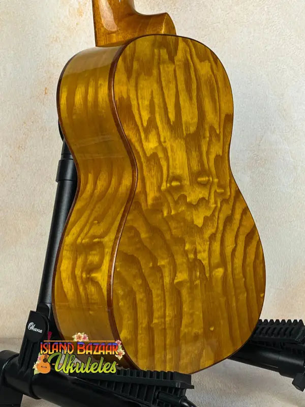 Golden acoustic guitar with quilted maple grain for Ohana CK-50WG Concert Ukulele