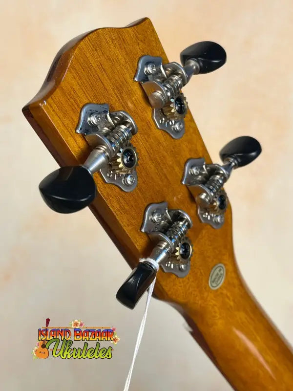 Guitar headstock with chrome tuning pegs on Ohana CK-50WG Concert Ukulele, Cedar & Willow