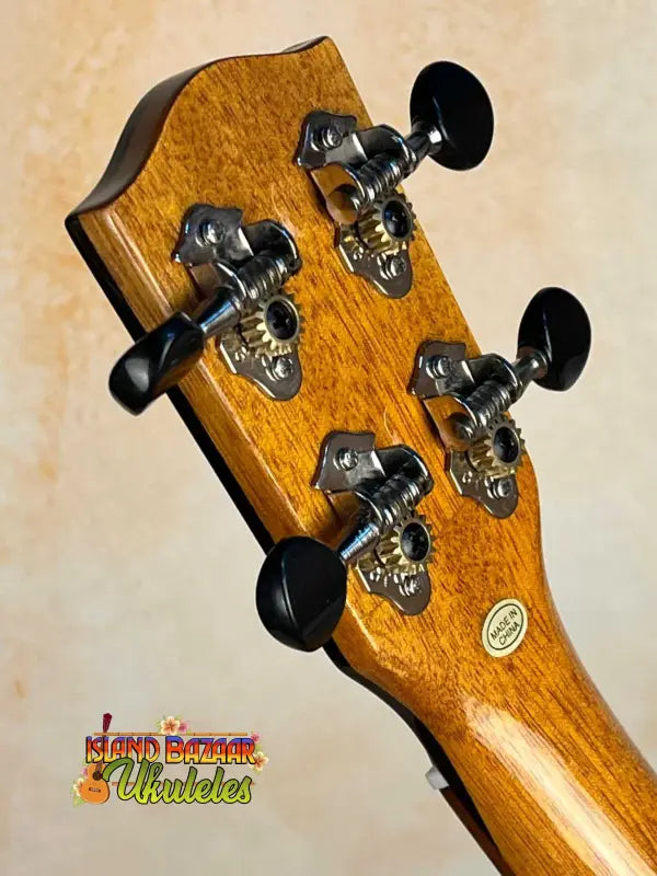 Guitar headstock with black tuning pegs on Ohana CK-60CG Mahogany Concert Ukulele neck