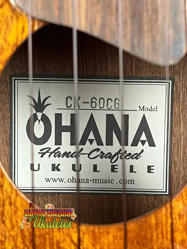 Label plate of Ohana CK-60CG Mahogany Concert Ukulele displaying brand and website
