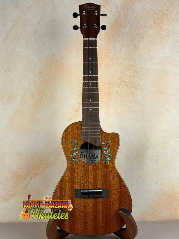 Wooden Ohana CK-60CG Mahogany Concert Ukulele with decorative design around sound hole