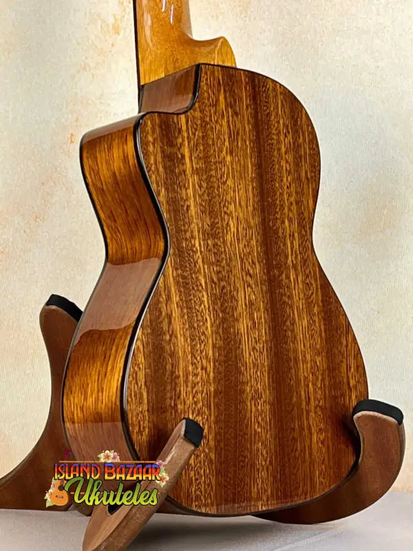 Wooden acoustic guitar showcasing beautiful grain patterns, Ohana CK-60CG Mahogany Concert Ukulele