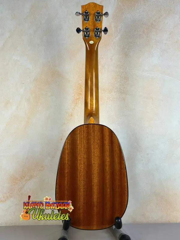 Wooden Ukulele with natural finish and black tuning pegs, Ohana PKC-50G Solid Cedar model