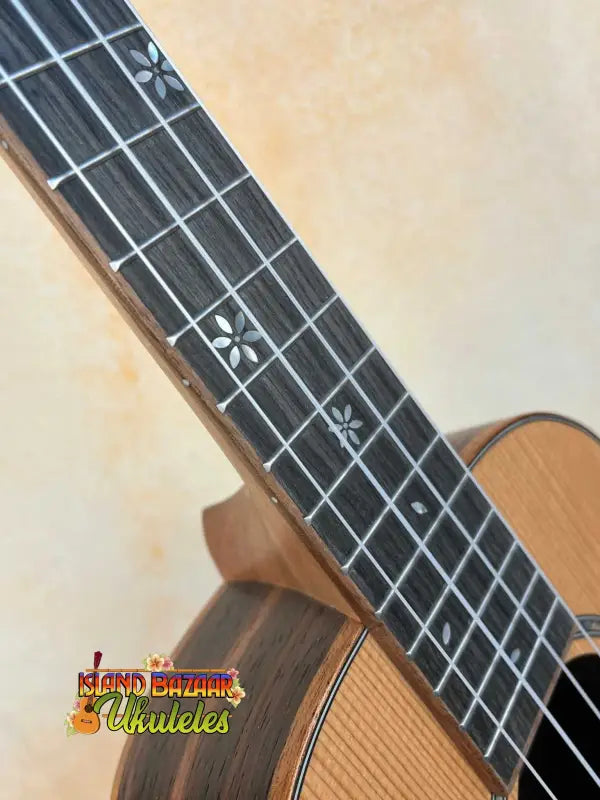 Wooden Ohana TK-50ME Solid Cedar Top Tenor Ukulele with decorative flower inlays