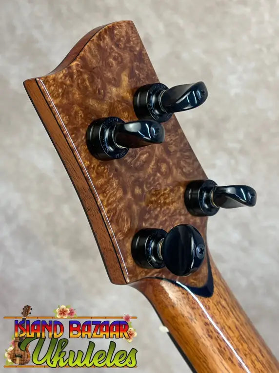PCH Custom Tenor #73 Deep Forest ukulele headstock with walnut grain and black pegs