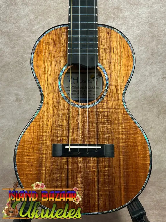 Sunshine tenor ukulele crafted from solid Hawaiian koa with abalone purfling and rosette