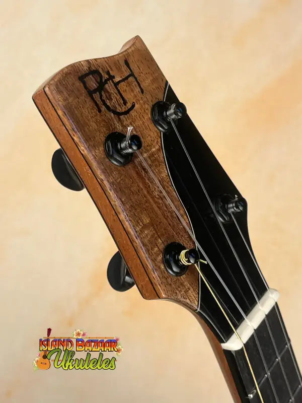 Ukulele headstock with tuning pegs on PCH Sunshine Tenor Ukulele by Phil Henderson in solid Hawaiian koa