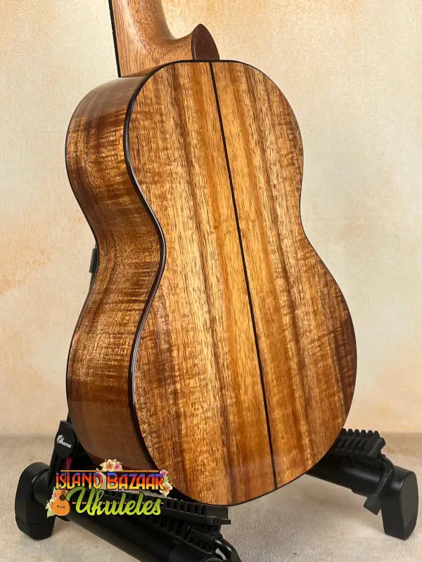 Wooden tenor ukulele with dark trim from Phil Henderson’s Solid Hawaiian Koa collection