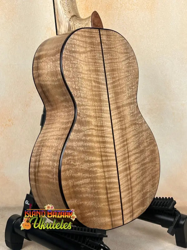 Wooden ukulele with curly grain from Phil Henderson’s The Ladder series in solid myrtle