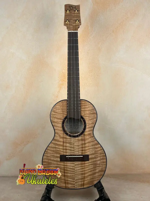 Wooden ukulele with dark fretboard from Phil Henderson PCH The Ladder in solid Myrtle