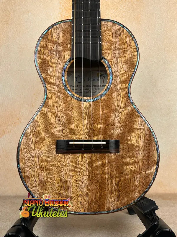 Ornate wooden Phil Henderson PCH Tenor Ukulele in solid mango wood craftsmanship