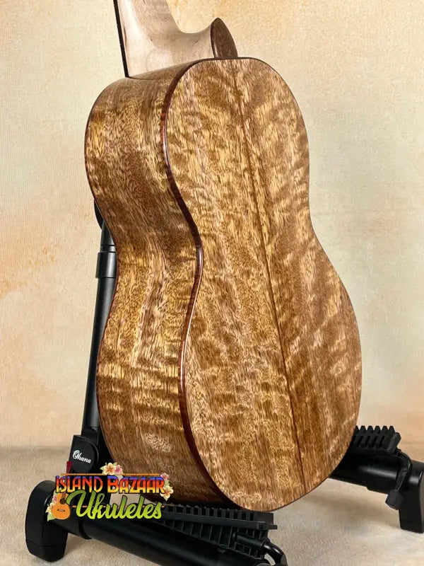 Wooden Phil Henderson Tenor Ukulele with figured grain and solid mango body