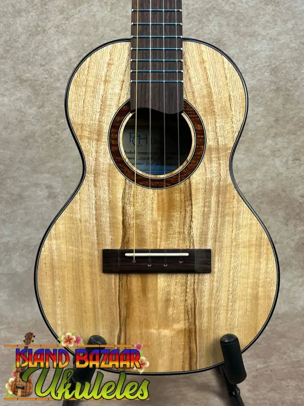 Wooden ukulele with dark fretboard from Phil Henderson’s PCH Tenor Ukulele collection