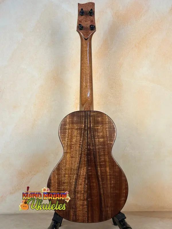 Wooden ukulele with koa grain, Phil Henderson Ukuleles Chocolate Thunder solid tenor