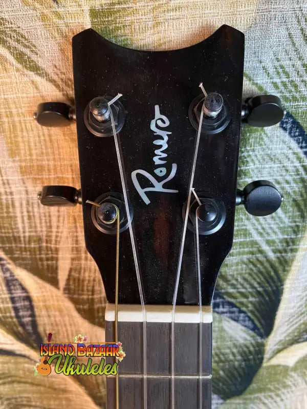 Black Rogue Ukulele headstock with tuning pegs on Romero Creations Concert Ukulele