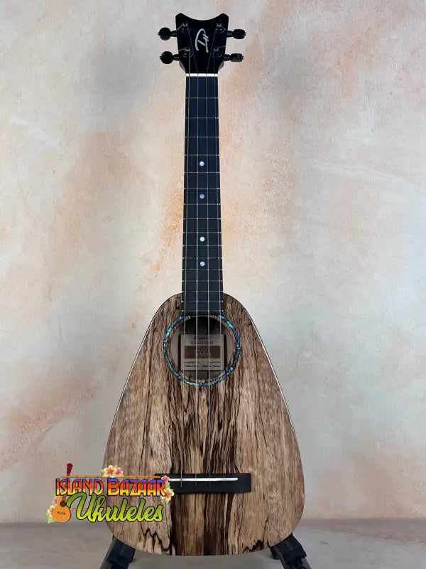 Wooden ukulele with spalted mango grain pattern from Romero Creations Tiny Tenor series