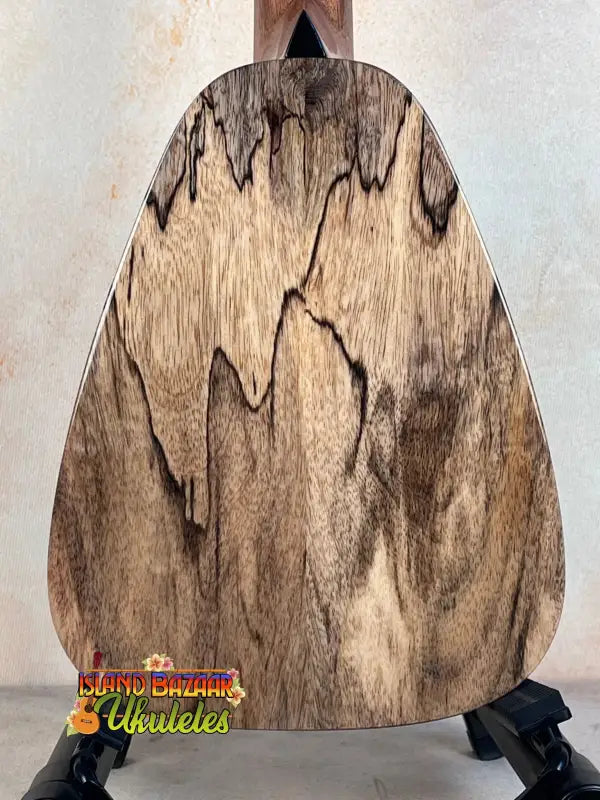 Piece of spalted mango wood featuring dark wavy patterns in Romero Creations Tiny Tenor