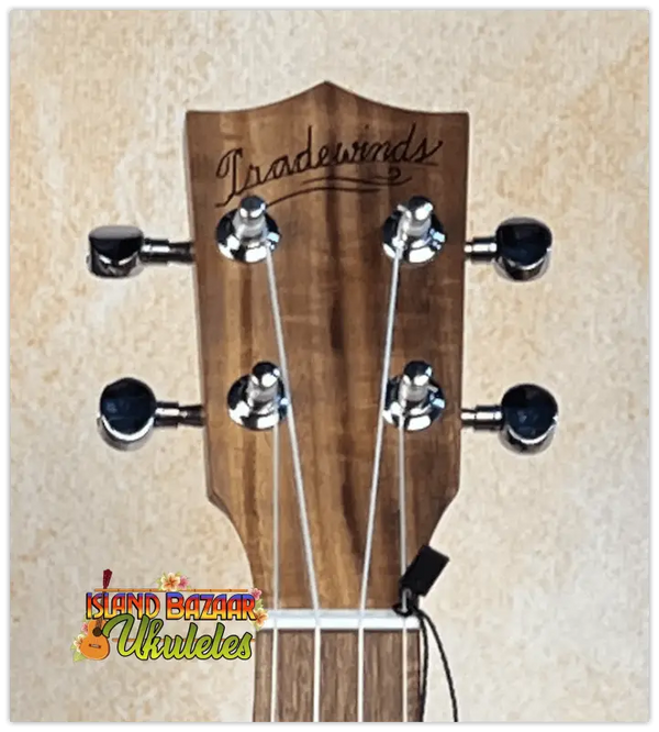 Guitar headstock with Tradewinds branding on Tenor Acacia Ukulele Beginners Bundle