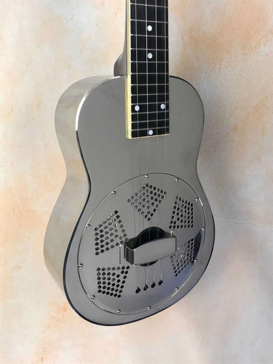 http://islandbazaarukes.com/cdn/shop/products/johnson-concert-resonator-ukulele-style-o-metal-body-gently-used-816844_1200x1200.jpg?v=1699482137