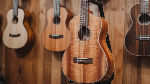Concert and tenor ukuleles with sunburst and natural finish – made in Hawaii ukuleles and stage-ready aesthetics